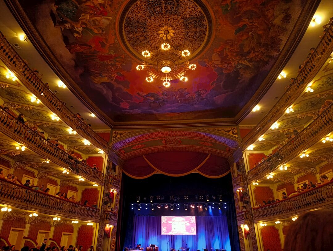 Ornate opera house interior with golden balconies