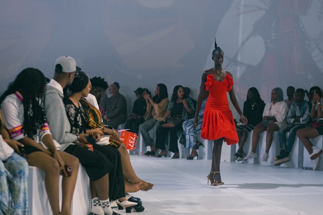 Fashion runway show with models walking